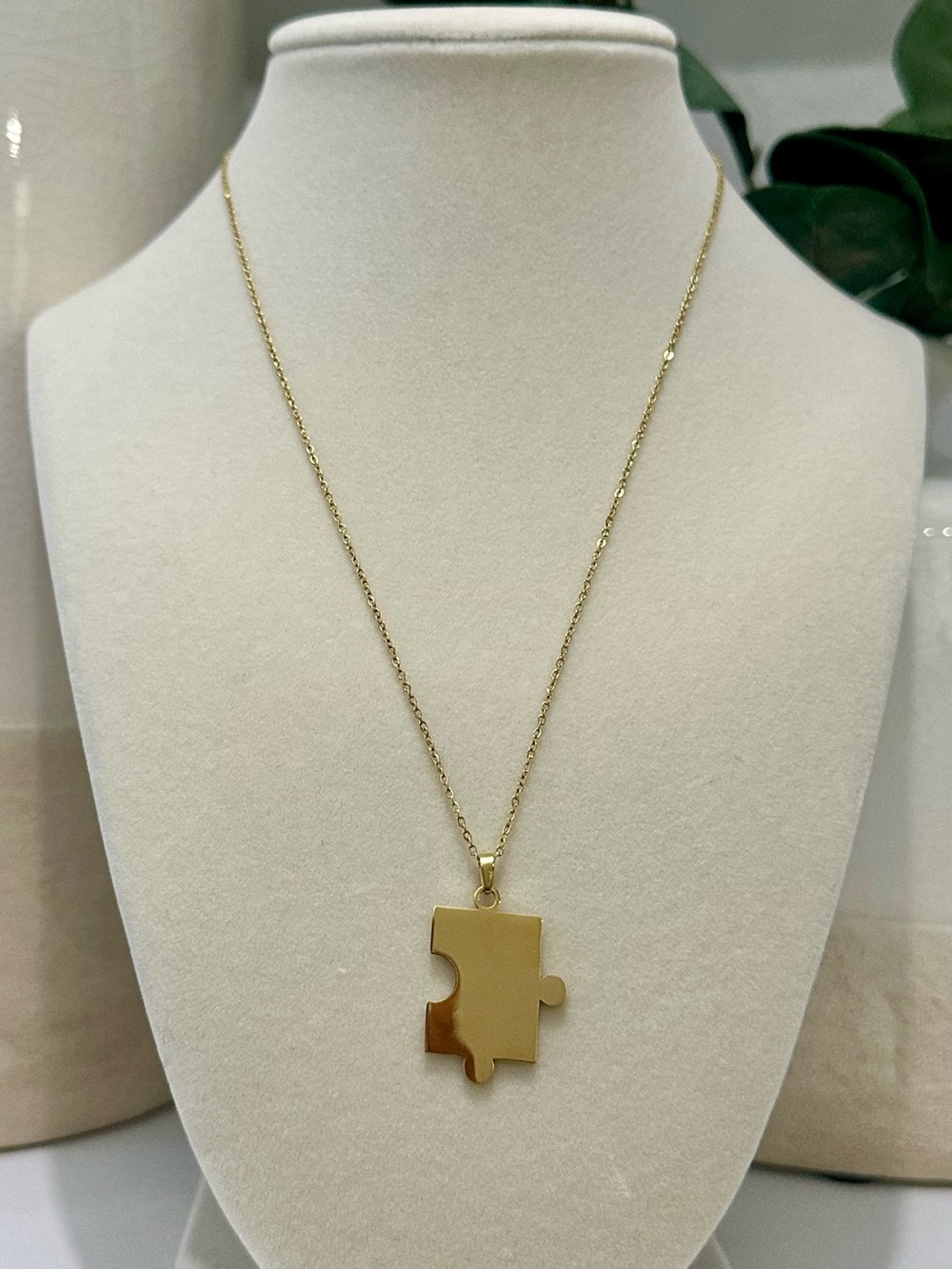 Gold Tone Puzzle Piece Pendant Necklace